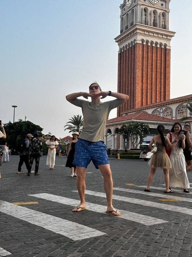 Daan messing around in front of a tower while his bot trades automatically