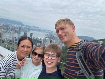 Daan with his family overlooking the city skyline